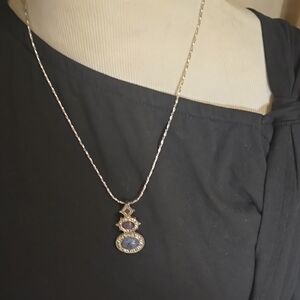 Elegant Gold and Silver Pendant Necklace